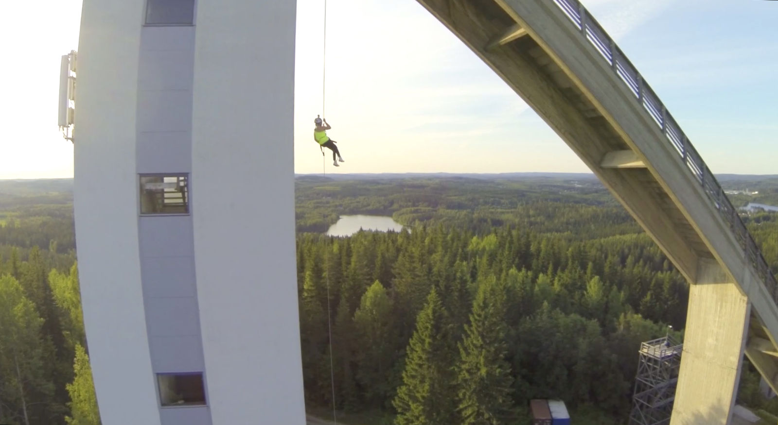 Rappelling from ski jump tower
